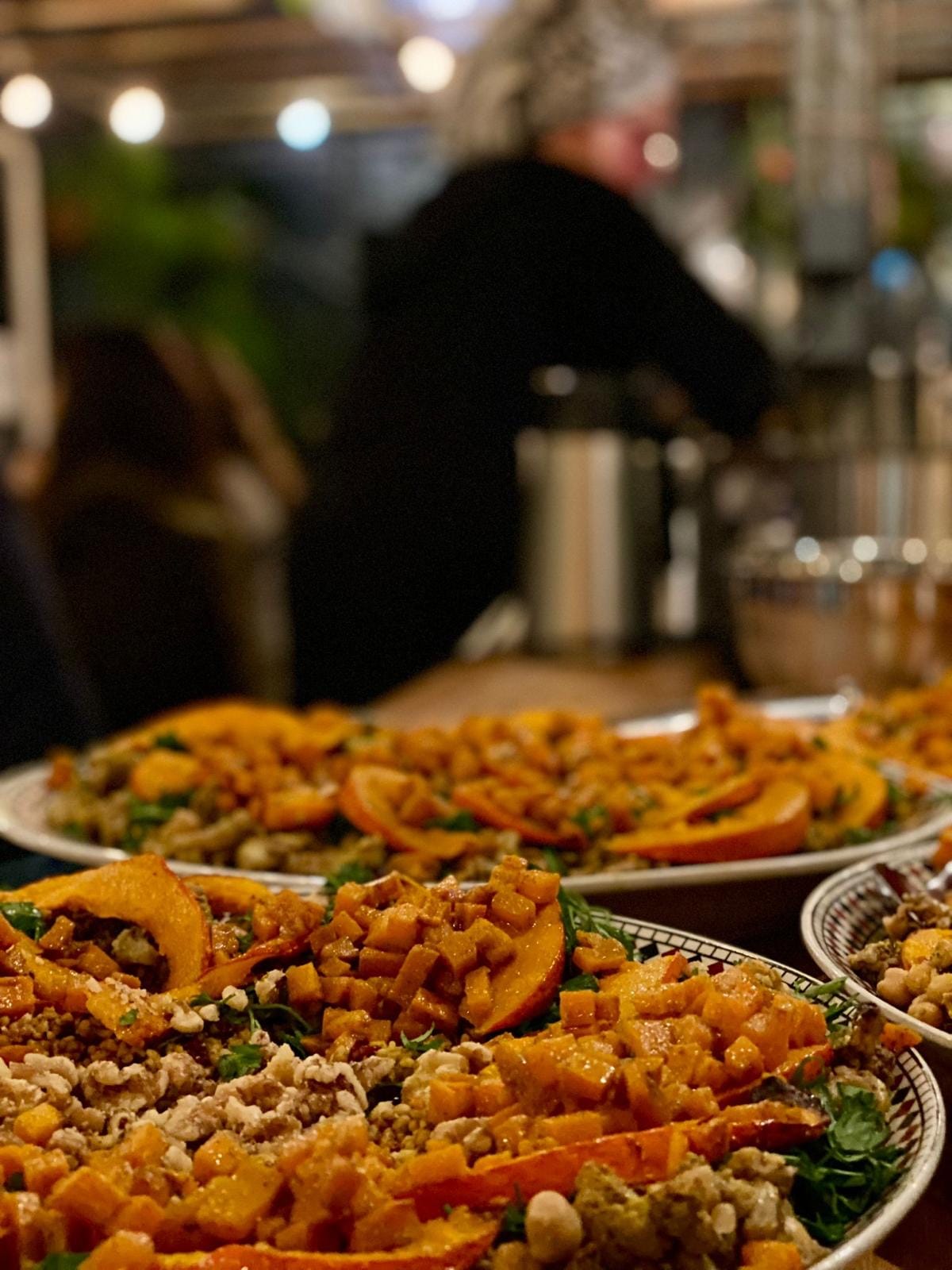 Image of large plates of Palestinian food.